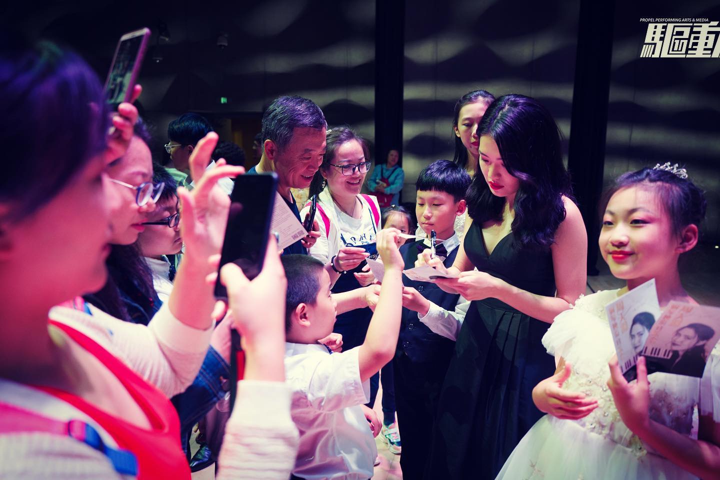 Tianyu signing autographs for fans
